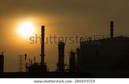 Oil Refining Industry The morning sunrise ,silhouette
