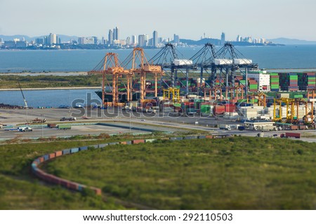 Shipping containers Adjacent to Port Used for freight elevator large ships.trains run into a container trainer