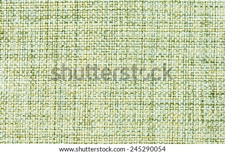 Beige and green cotton smooth fabric closeup.  background
