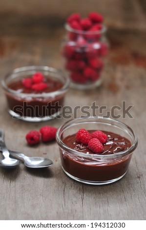 Chocolate mousse with raspberries, selective focus
