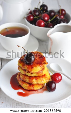 Cottage cheese pancakes with cherry, perfect for breakfast