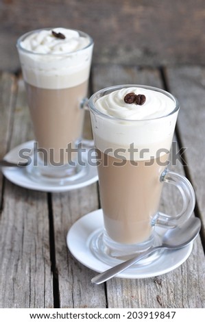 Coffee panna cotta in glass or coffee with whipped cream, selective focus