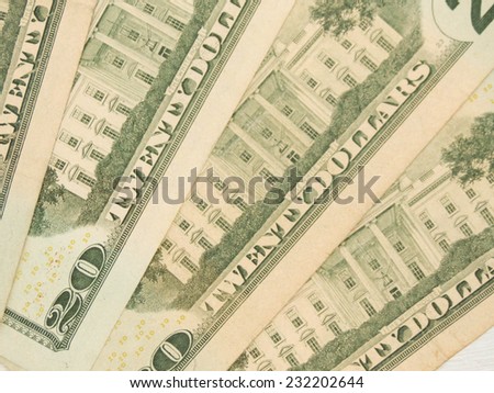 US dollar banknotes - twenty-dollar bill featuring the White House on the back side