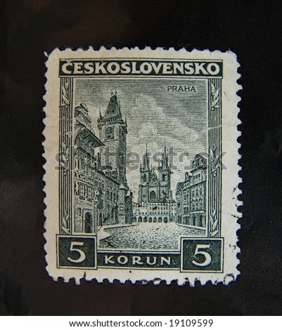 Prague Town Hall (Stare radnice), Old town square (Staromestske namesti) and church mail stamp isolated on black background