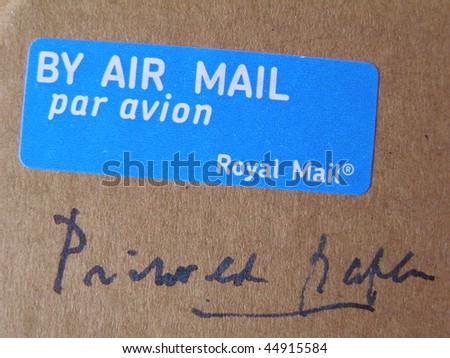 printed paper (elegant British handwritten note) - by air mail / par avion (label)