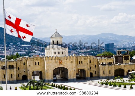 Tbilisi panorama with georgian flag
