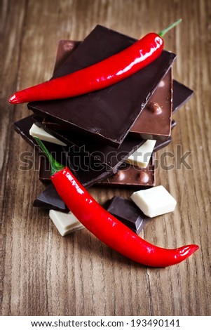Mix chocolate tower with red hot chili pepper.