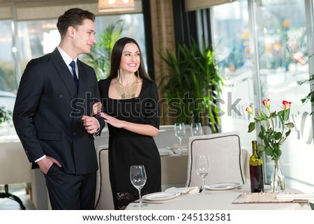 Perfect romantic dinner. Portrait of couple in love came to restaurant for the romantic dinner together