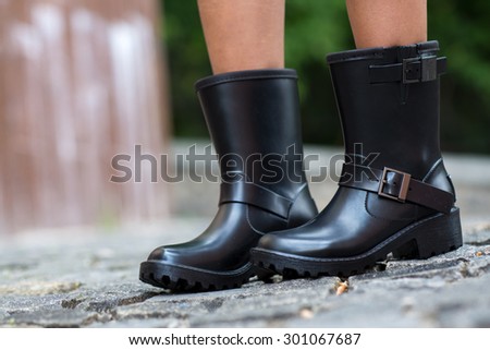 Close up of stylish female shoes.  Outdoor fashion shoes footwear concept. Fashionable boots.