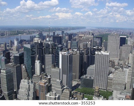 The Towers of Midtown, New York City, The Hudson River and the George Washington Bridge.