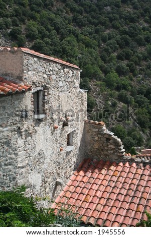 Rooftops of a Restored House.