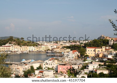Ischia Porto, Italy, showing harbor district. Castle Aragonese is in the distance.