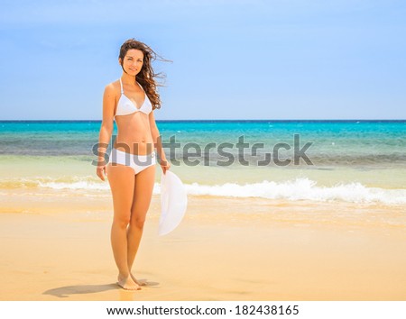 Young woman on ocean beach