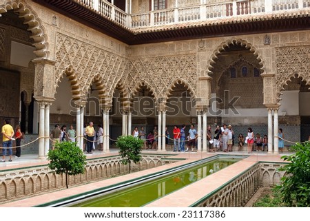 Alcazar, Sevilla, Spain - JULY 20, 2008: Alcazar in Sevilla is one of biggest tourist attraction sites in Europe. Hundreds of people from around the world visit this architecture monument daily.