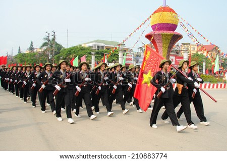 Dien Bien Phu, Dien Bien, VIETNAM May 7, 2014: The 60th anniversary of the Dien Bien Phu victory: Female militia of South Vietnam military parade celebrating the 60th victory of Dien Bien Phu