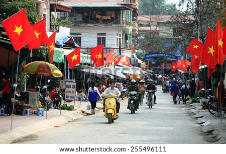 Dien Bien Phu - Vietnam, February 13, 2015: All information in the neighborhood, with the flag of Vietnam during traditional festivals.