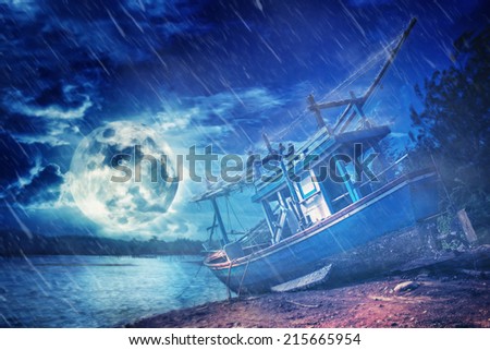 Ship on the beach in full moon fantasy night storm rain