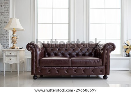 vintage style of interior decoration the leather sofa in white room