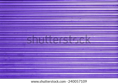metal security roller door background on purple tone