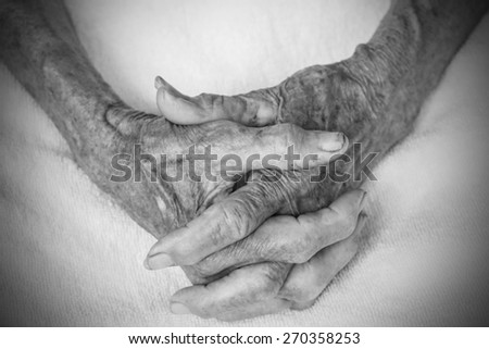 Hands of the old woman. Black and White.