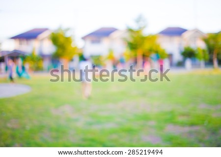 Blur image of children\'s playground at public park for background usage.