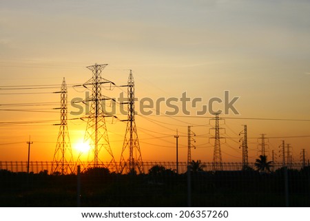 transmission power line on sunset