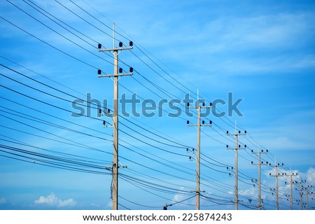 Power lines on the blue sky