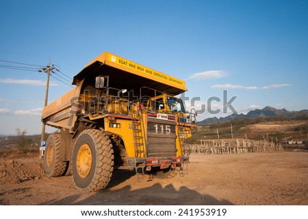 LAMPANG, THAILAND - DEC 29: coal-preparation plant. Big yellow mining truck at work site coal transportation, December, 29, 2014 in Lampang, Thailand