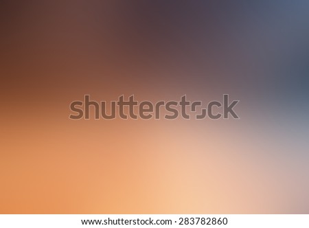 Abstract orange and blue blurry background for graphic design