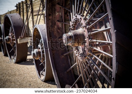Steel wheels of antique steam engine.