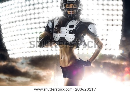 American football woman player in action