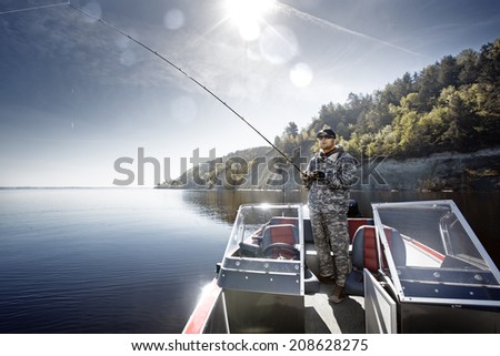 Fishing man in boat