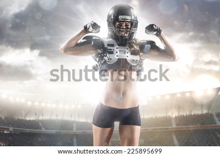 American football woman player in action on the stadium