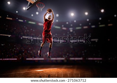 red Basketball player in action in gym