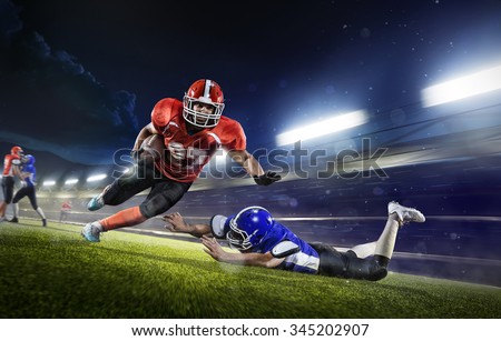 american football players in the action grand arena
