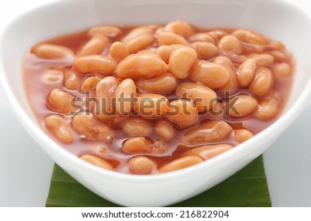 Canned beans on white plate