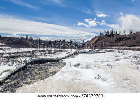 Rambunctious river in Altai mountains in spring