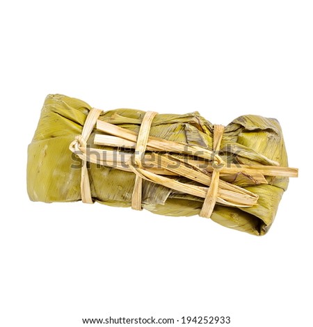 Rice wrapped in banana leaf isolated