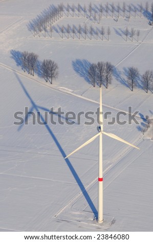 Aerial view of a wind turbine in the snow