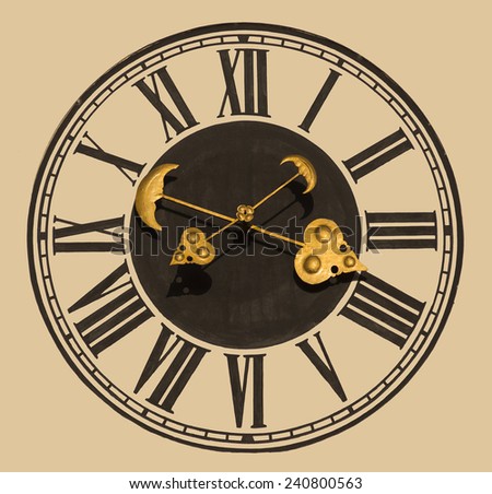 Golden church clock showing time