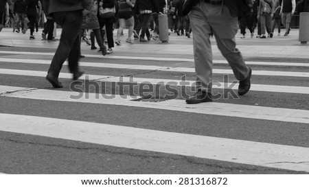 Busy city people on zebra crossing street