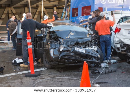 Tour bus got accident, rammed a car alongside San Francisco\'s Union Square on November 13 2015, San Francisco USA