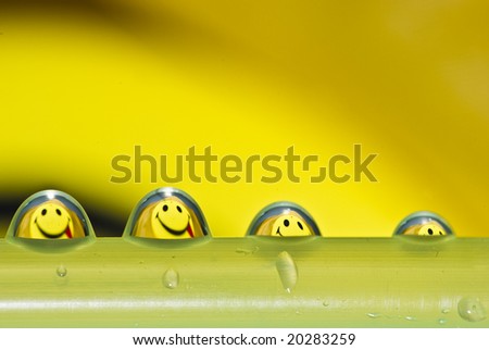 Funny water droplets with smiley reflection