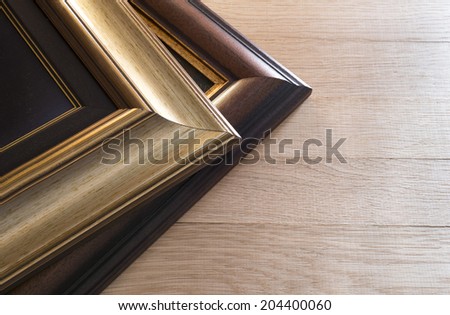 Golden plated wooden painting frames