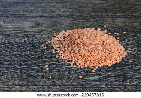 Pile of orange lentil seeds