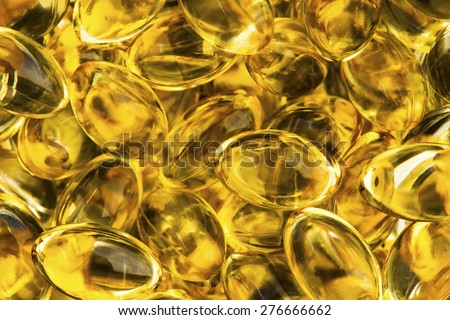 Golden yellow pills background