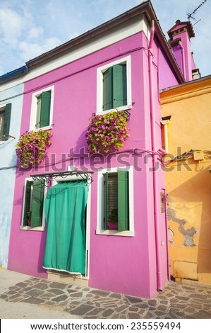 Little pink house in Burano, an island full of colors in the lagoon near Venice