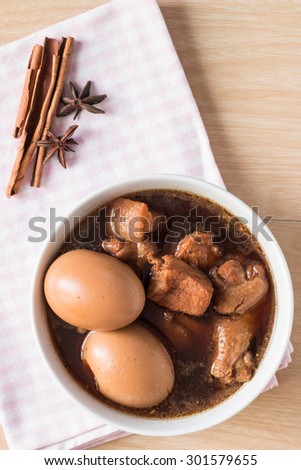 Eggs and pork in brown sauce,Thai food.From above.