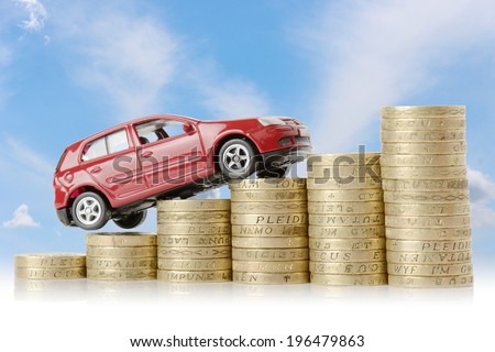 a red car climbing up a money chart isolated on a white background a red car climbing up a money chart isolated on a white background