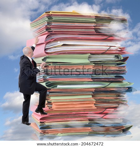businessman climbing pile of endless paperwork (digital composite)